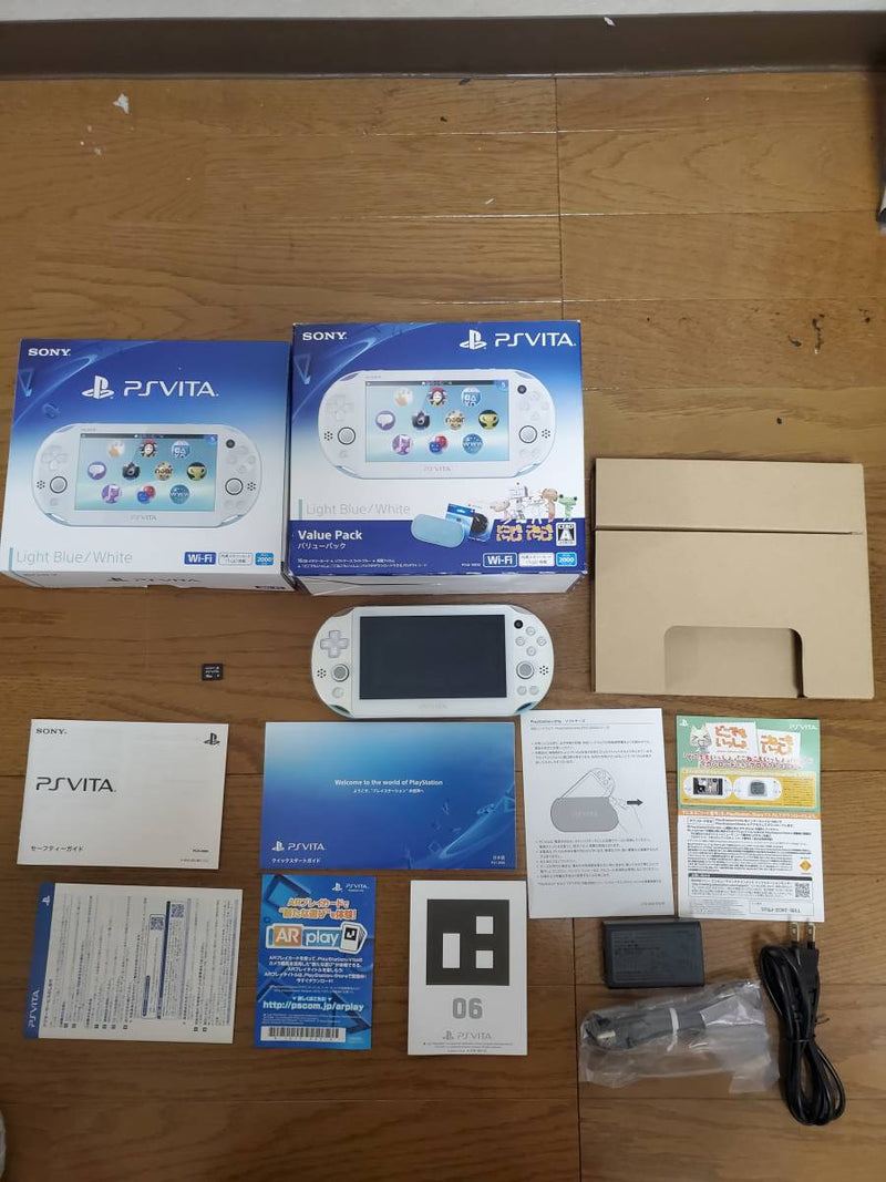 Sony PS Vita (Like New) - Light Blue/White + 7500 Games Video Game Consoles Sony 